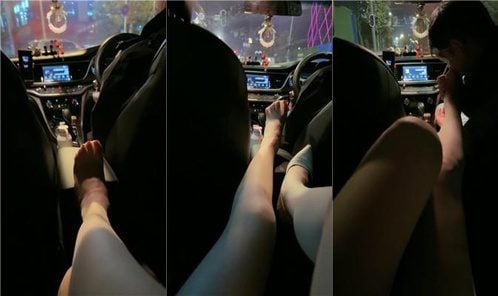 リナ車の中で犬に肉を舐めさせる