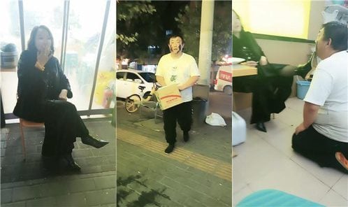 楽葉ボスの女性が乞食犬をからかう