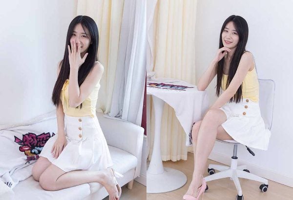 Wulian Media | Cai Cai wearing high heels, high-heeled sandals, short white cotton socks, and bare feet in a video.