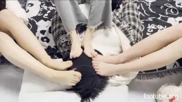 Two sisters stepping on a dog's head, licking its feet, and kicking its face (ACYC-5397)